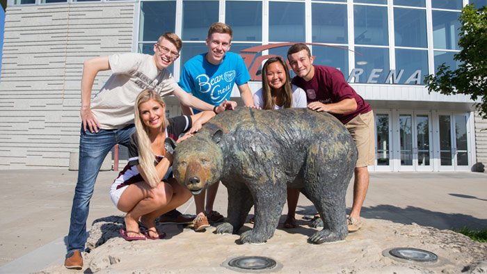 students around the Bear at Great Southern Bank Arena