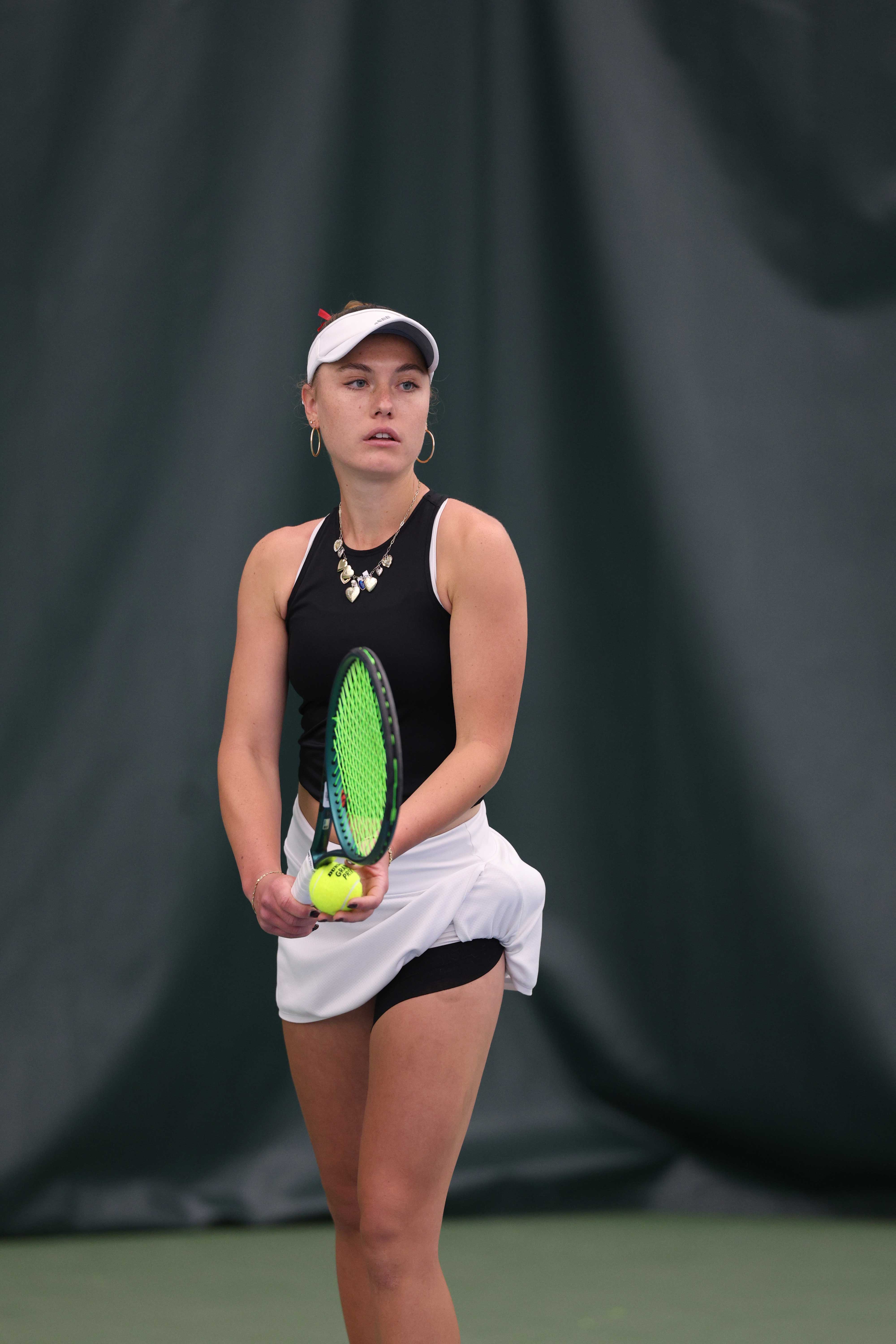 Bears tennis player readies to serve